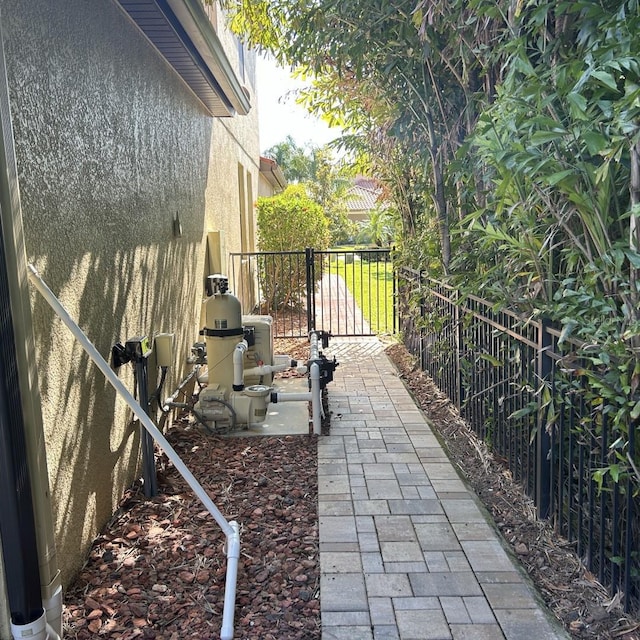 4622 Grand Lakeside Dr, Palm Harbor, FL 34684 - view of patio featuring a gate