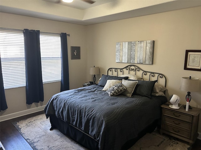4622 Grand Lakeside Dr, Palm Harbor, FL 34684 - bedroom with wood finished floors and baseboards