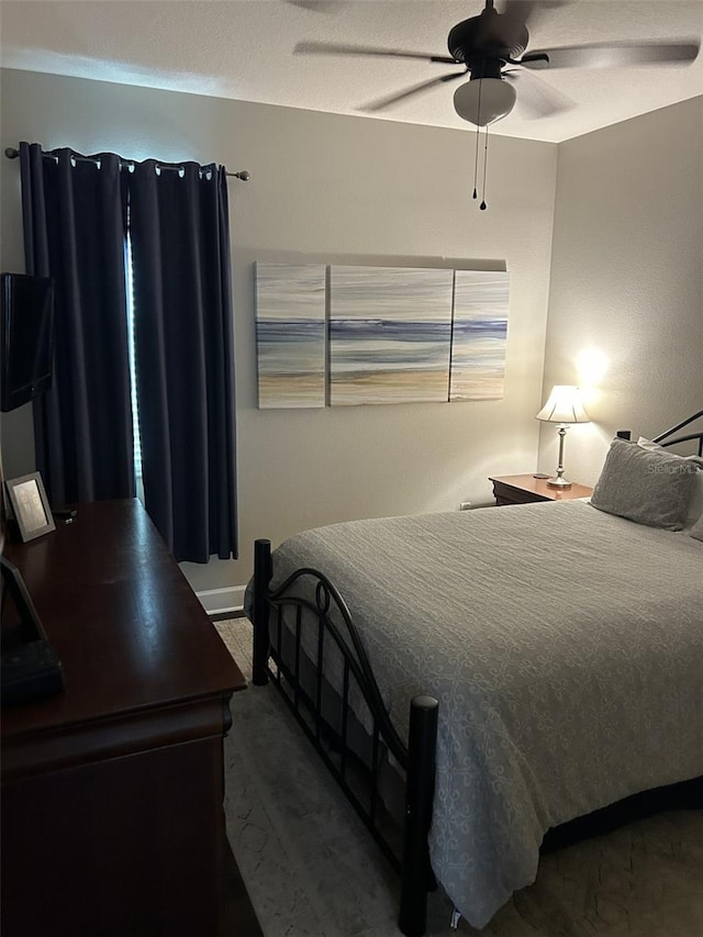 4622 Grand Lakeside Dr, Palm Harbor, FL 34684 - bedroom with ceiling fan