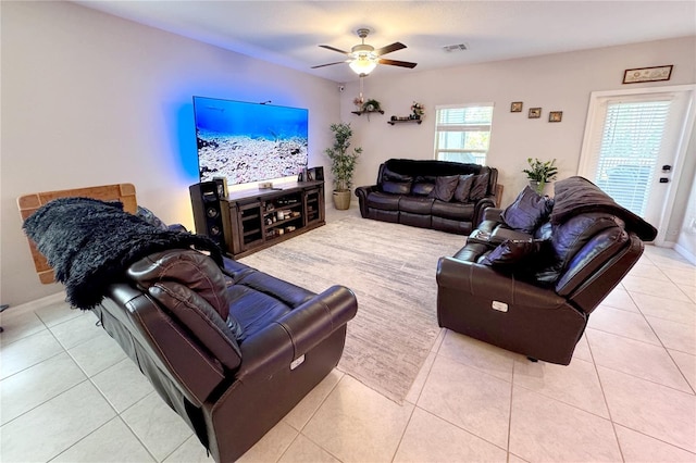 5426 Rainwood Meadows Dr, Apollo Beach, FL 33572 - living room featuring visible vents, ceiling fan, and tile patterned floors