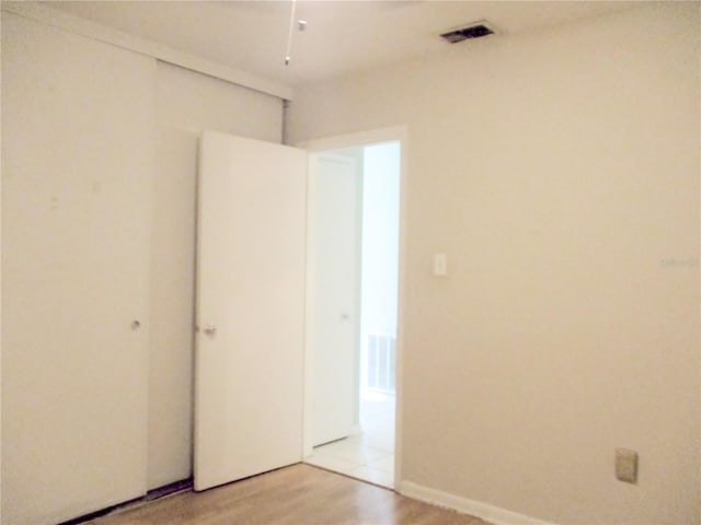 6339 Pontiac Ln, North Port, FL 34287 - unfurnished room with light wood-style floors