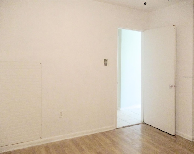 6339 Pontiac Ln, North Port, FL 34287 - unfurnished room with wood finished floors and baseboards