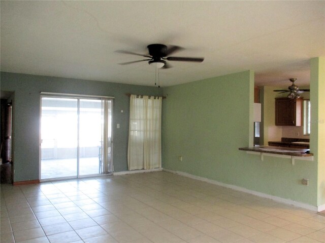 6339 Pontiac Ln, North Port, FL 34287 - spare room featuring ceiling fan and light tile patterned flooring