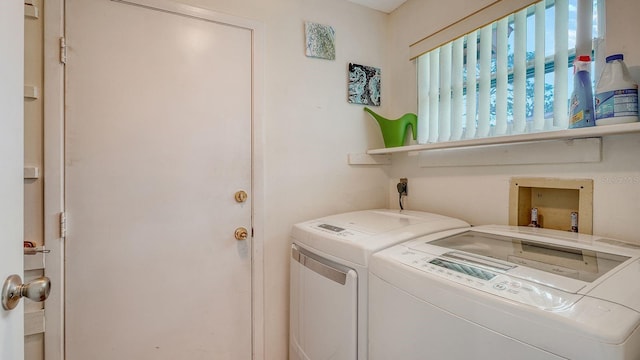 laundry area with washer and dryer and laundry area