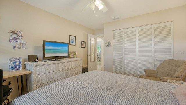 bedroom featuring visible vents, a closet, and a ceiling fan