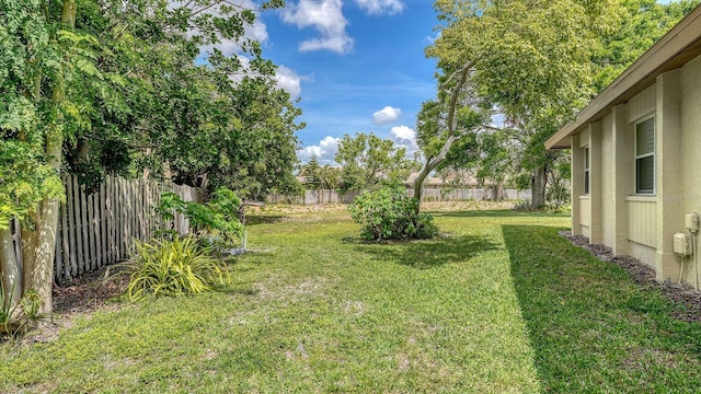 view of yard with fence