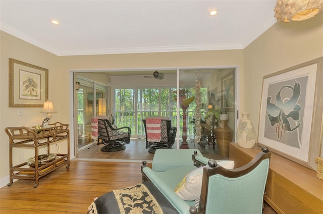 interior space featuring recessed lighting, wood-type flooring, and ornamental molding