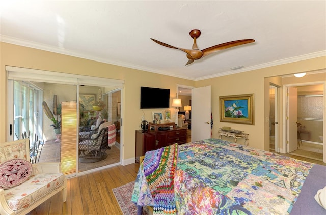 bedroom featuring visible vents, baseboards, ornamental molding, a ceiling fan, and wood-type flooring