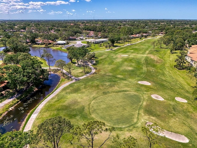 bird's eye view featuring golf course view, a residential view, and a water view