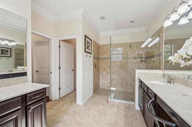 full bath with a walk in shower, visible vents, and crown molding