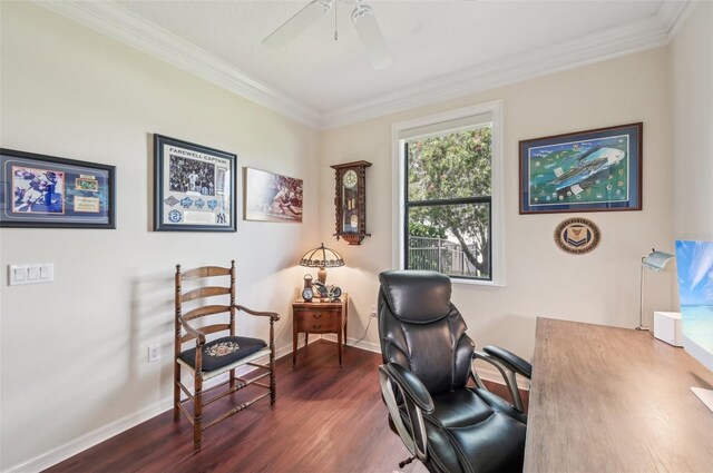 office area featuring ornamental molding, ceiling fan, baseboards, and dark wood finished floors