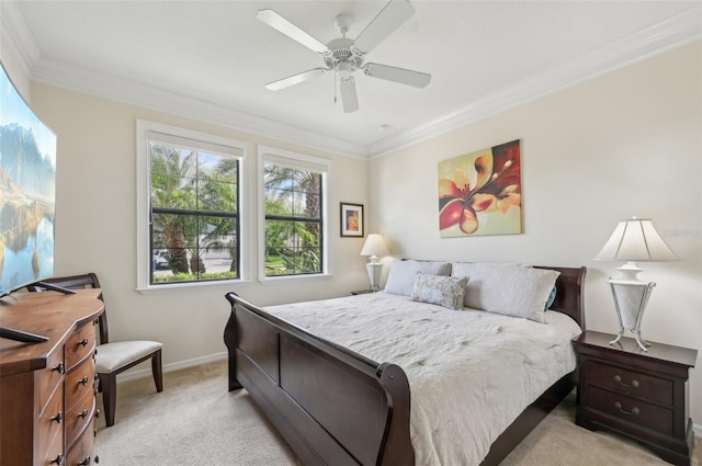 bedroom featuring light carpet, ceiling fan, baseboards, and ornamental molding