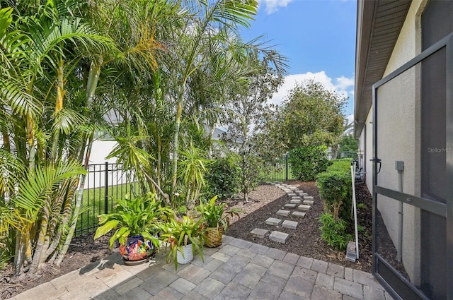 view of patio / terrace featuring fence