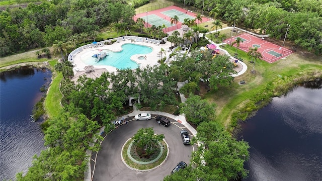 birds eye view of property featuring a water view