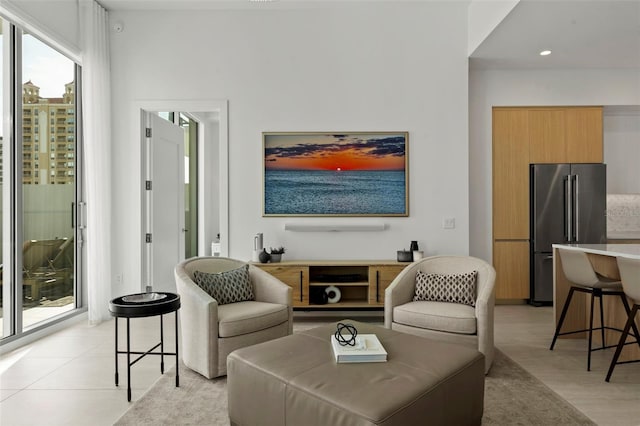 301 Quay Commons Unit 507, Sarasota, FL 34236 - living area with recessed lighting and light wood-style flooring