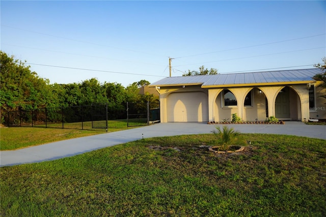 exterior space with driveway, fence, and covered porch