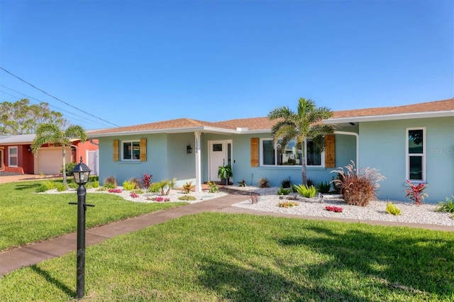 10304 Sandpiper Rd W, Bradenton, FL 34209 - single story home featuring a front yard and stucco siding