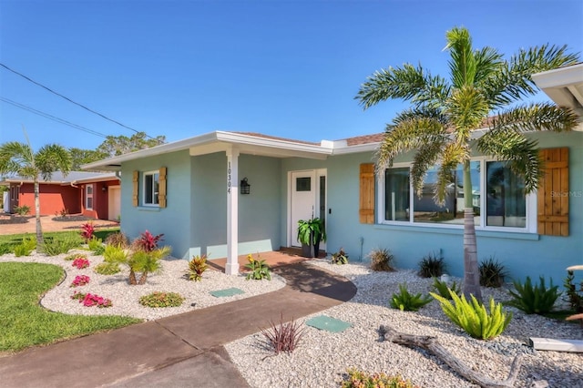 10304 Sandpiper Rd W, Bradenton, FL 34209 - ranch-style house featuring stucco siding