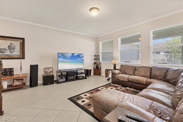 living area featuring light tile patterned floors, crown molding, and baseboards