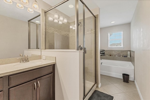 full bath with tile patterned floors, a stall shower, and vanity