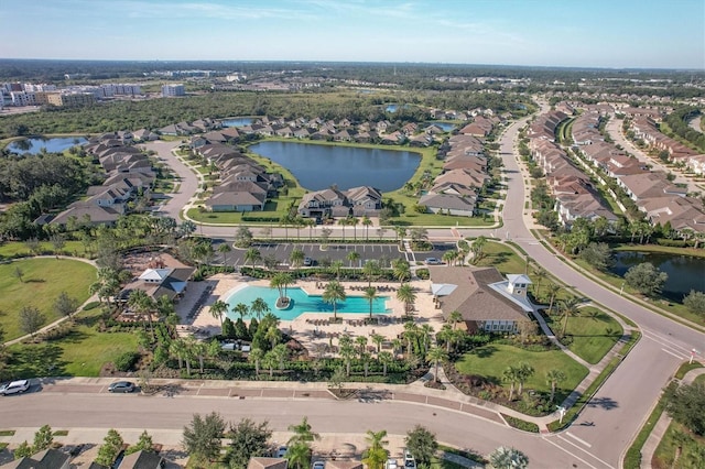 aerial view featuring a water view and a residential view