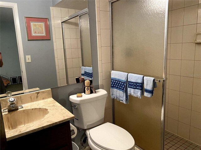 3 Lakeside Dr, Ocala, FL 34482 - bathroom featuring vanity, a stall shower, and toilet