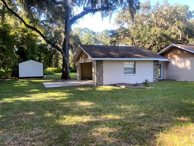 3 Lakeside Dr, Ocala, FL 34482 - view of shed with a carport