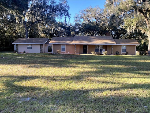 3 Lakeside Dr, Ocala, FL 34482 - view of front of home featuring a front yard and a chimney