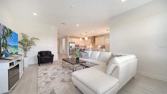 4725 Antrim Dr, Sarasota, FL 34240 - living area featuring baseboards, recessed lighting, and wood tiled floors