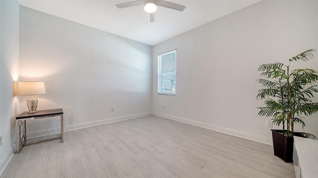 4725 Antrim Dr, Sarasota, FL 34240 - empty room with light wood finished floors, ceiling fan, and baseboards