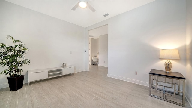 4725 Antrim Dr, Sarasota, FL 34240 - interior space with light wood-style floors, a ceiling fan, and baseboards