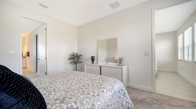 4725 Antrim Dr, Sarasota, FL 34240 - bedroom with baseboards and light carpet