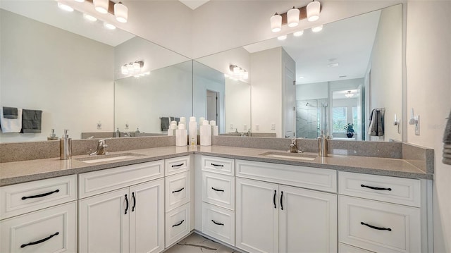 4725 Antrim Dr, Sarasota, FL 34240 - full bathroom featuring double vanity, marble finish floors, and a shower stall