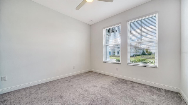 4725 Antrim Dr, Sarasota, FL 34240 - carpeted spare room featuring baseboards and a ceiling fan