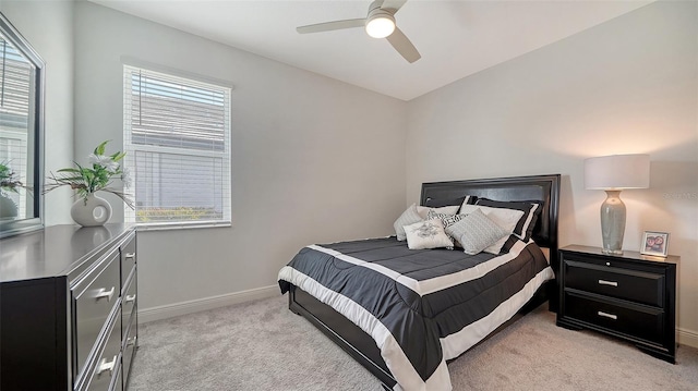 4725 Antrim Dr, Sarasota, FL 34240 - bedroom with light colored carpet, baseboards, and ceiling fan