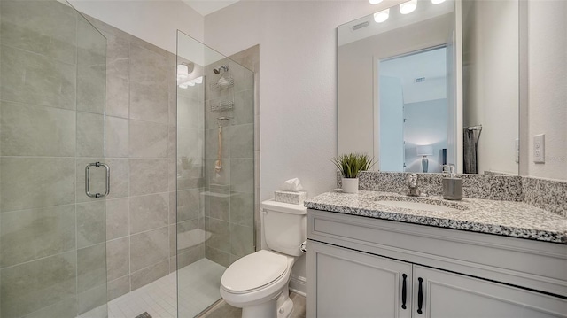 4725 Antrim Dr, Sarasota, FL 34240 - bathroom with a stall shower, vanity, and toilet