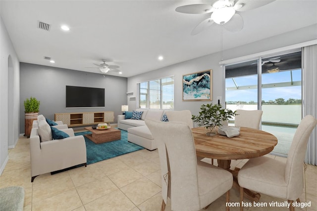 living area with recessed lighting, ceiling fan, visible vents, and light tile patterned floors