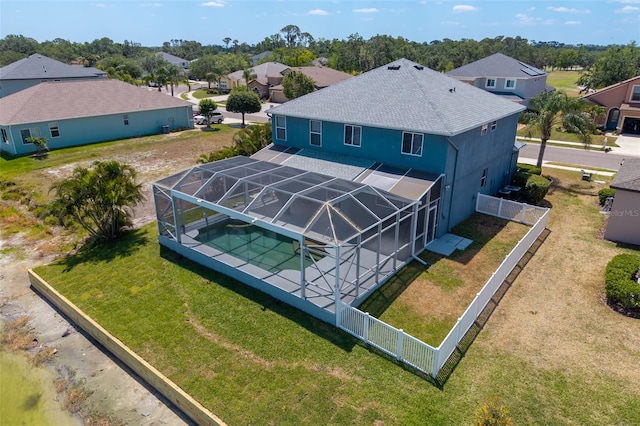 birds eye view of property with a residential view