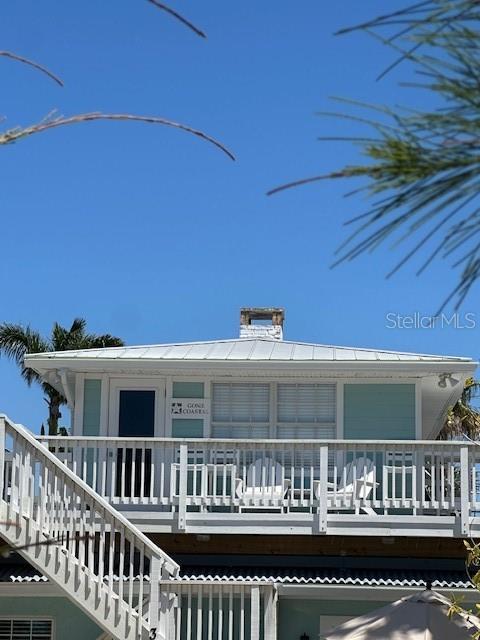 104 29th St Unit 3, Holmes Beach, FL 34217 - back of property with covered porch