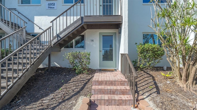 6951 Gulf Of Mexico Dr Unit 14, Longboat Key, FL 34228 - doorway to property featuring stucco siding