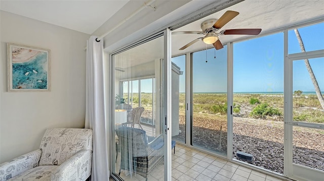 6951 Gulf Of Mexico Dr Unit 14, Longboat Key, FL 34228 - sunroom / solarium featuring a water view and a ceiling fan