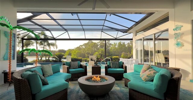 8687 Woodbriar Dr, Sarasota, FL 34238 - view of patio / terrace with an outdoor living space with a fire pit and a lanai