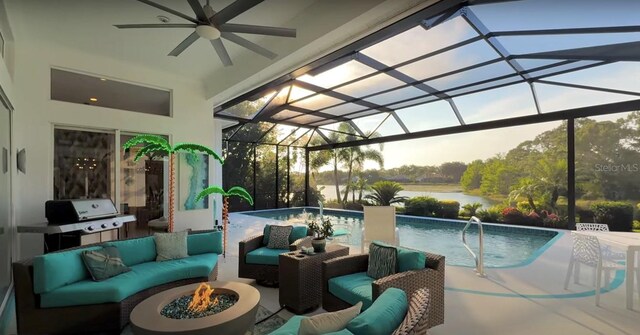 8687 Woodbriar Dr, Sarasota, FL 34238 - view of patio / terrace with an outdoor living space with a fire pit, ceiling fan, an outdoor pool, a grill, and glass enclosure
