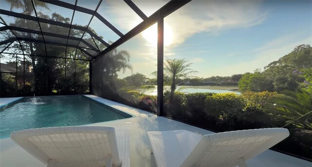 8687 Woodbriar Dr, Sarasota, FL 34238 - outdoor pool with a water view and a lanai