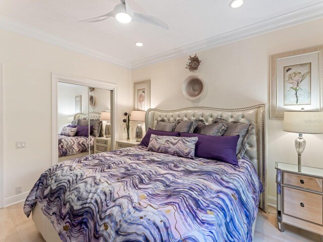 8687 Woodbriar Dr, Sarasota, FL 34238 - bedroom featuring ornamental molding, a closet, recessed lighting, ceiling fan, and wood finished floors