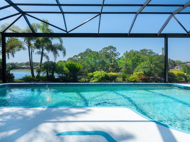 8687 Woodbriar Dr, Sarasota, FL 34238 - swimming pool with a lanai and a patio