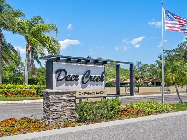 8687 Woodbriar Dr, Sarasota, FL 34238 - view of community / neighborhood sign