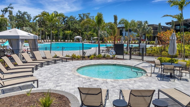 8355 Velda Trl, Sarasota, FL 34241 - community pool featuring a hot tub and a patio area