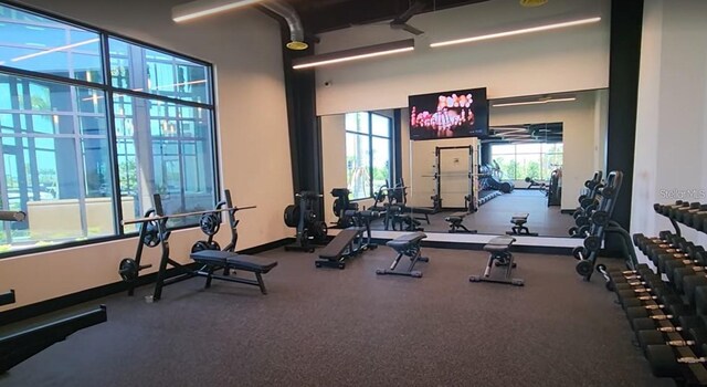 8355 Velda Trl, Sarasota, FL 34241 - exercise room featuring baseboards