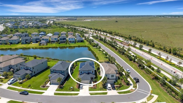8355 Velda Trl, Sarasota, FL 34241 - aerial perspective of suburban area featuring a large body of water